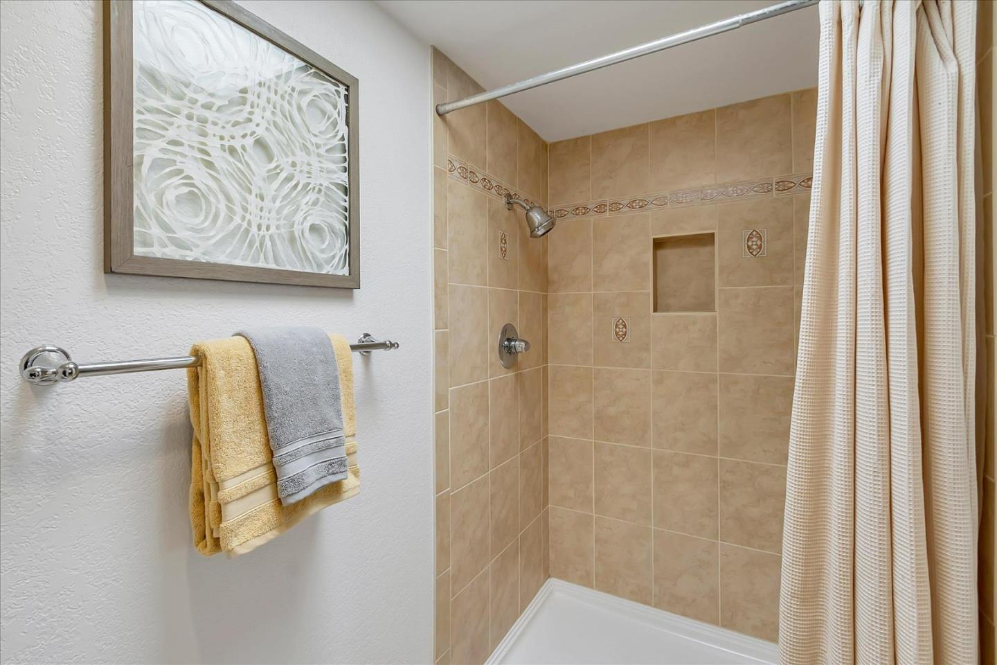 14566 South Bascom Avenue Los Gatos, CA 95032 - Photo 17 of 28 a bathroom with a shower