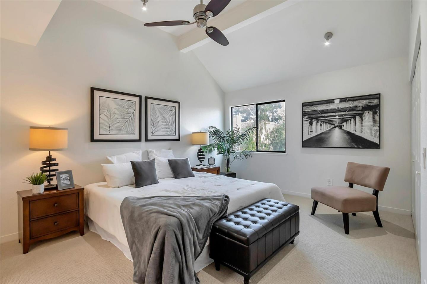 14566 South Bascom Avenue Los Gatos, CA 95032 - Photo 19 of 28 a bedroom with a bed and a couch