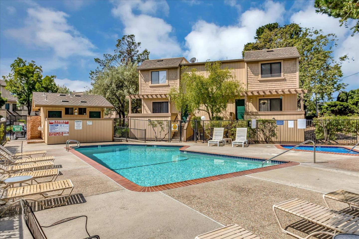 14566 South Bascom Avenue Los Gatos, CA 95032 - Photo 26 of 28 a front view of a house with garden