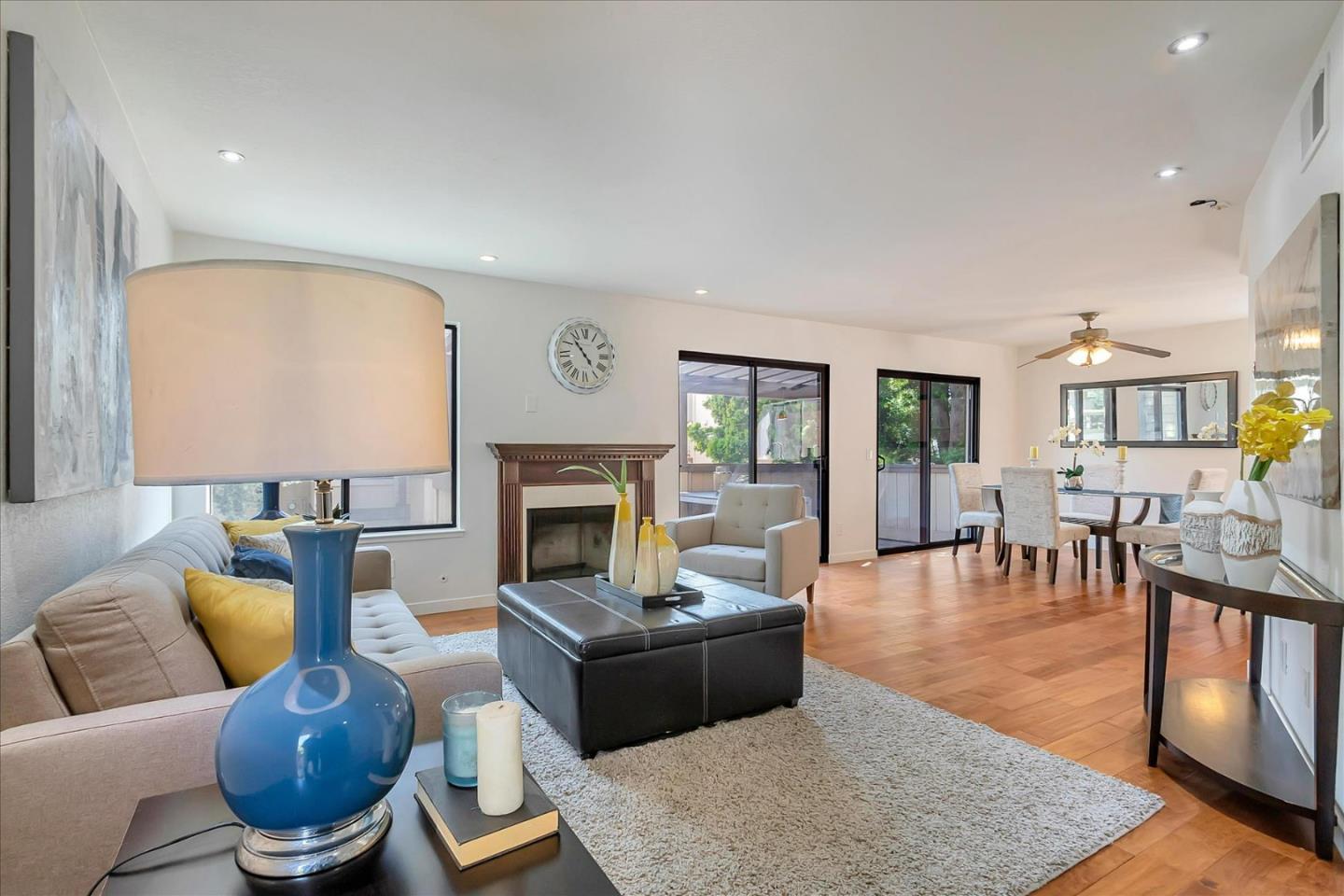 14566 South Bascom Avenue Los Gatos, CA 95032 - Photo 4 of 28 a living room with furniture and a fireplace