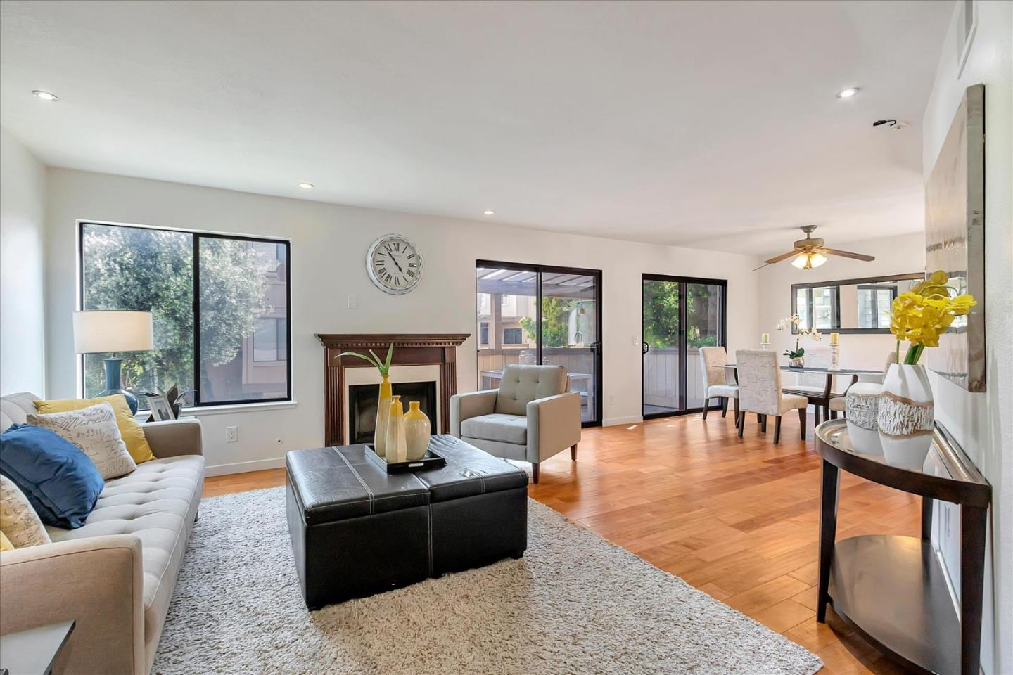 14566 South Bascom Avenue Los Gatos, CA 95032 - Photo 5 of 28 a living room with furniture and a fireplace