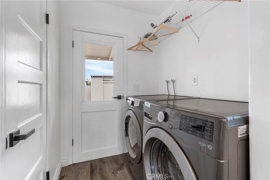 9131 Hall Road Downey, CA 90241 - Photo 19 of 32 a view of storage and utility room with washer and dryer
