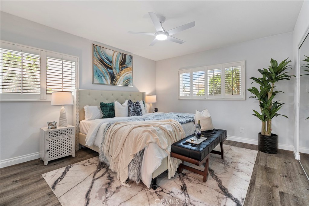 9131 Hall Road Downey, CA 90241 - Photo 20 of 32 a bedroom with a bed and a potted plant