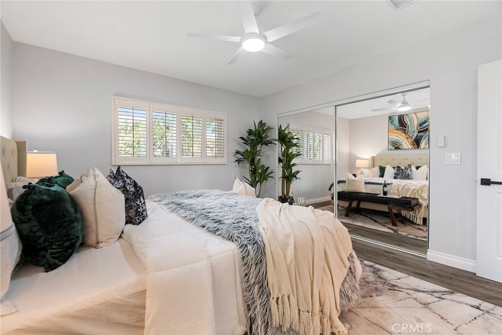 9131 Hall Road Downey, CA 90241 - Photo 21 of 32 a bedroom with a bed and a large window
