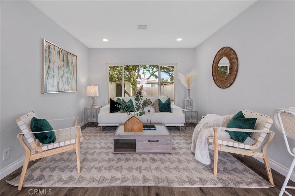 9131 Hall Road Downey, CA 90241 - Photo 7 of 32 a living room with furniture and a large window