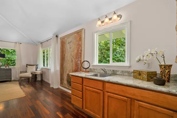 a kitchen with sink and window
