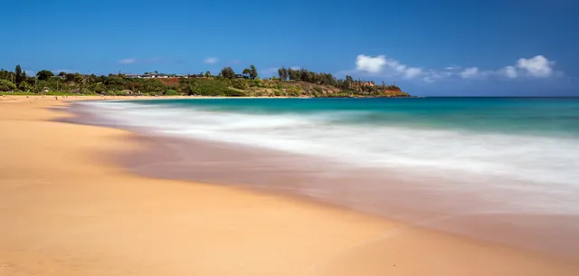 a view of a lake in middle of the town