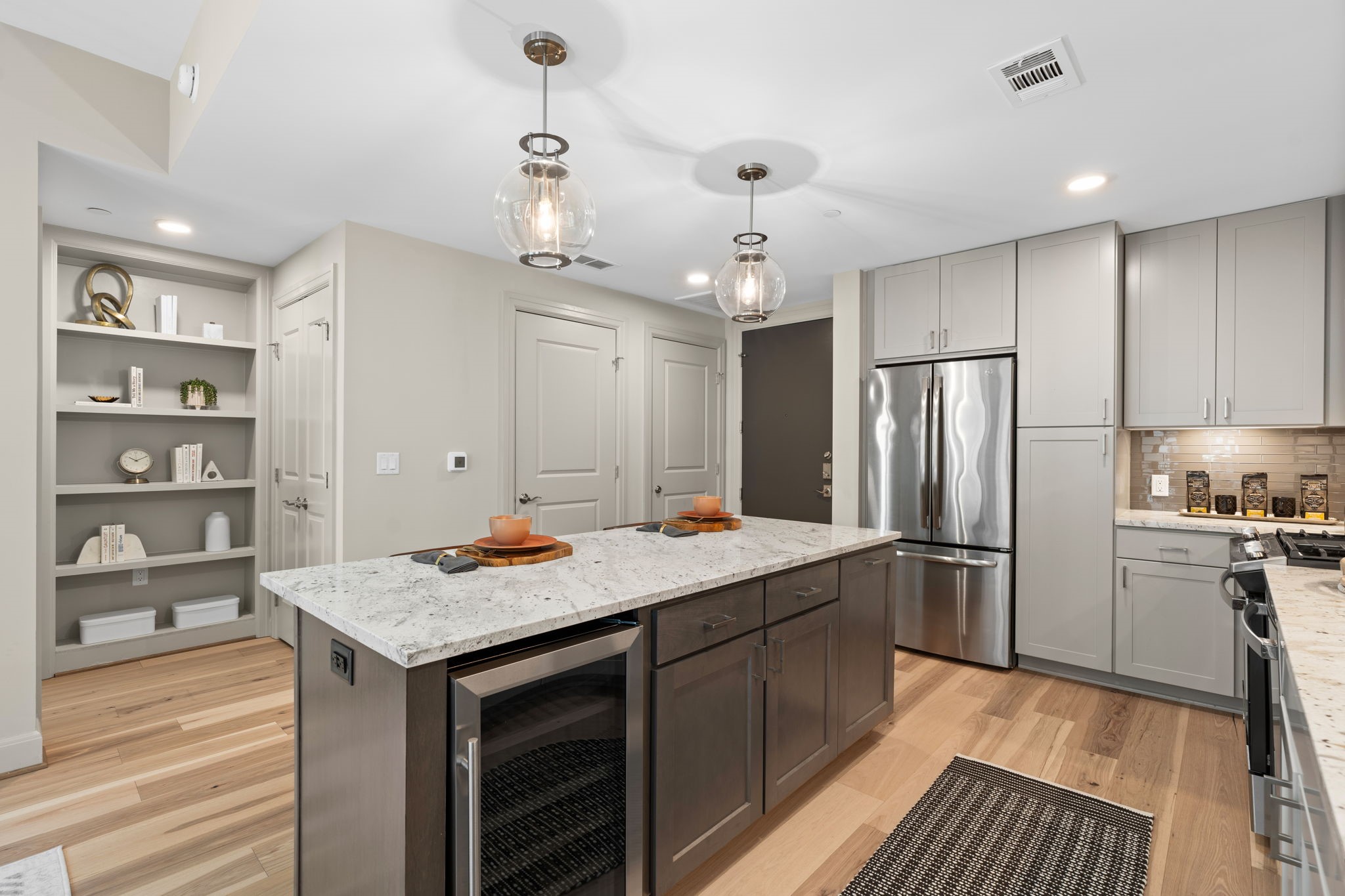 2511 Willowick Road, Unit 334 Houston, TX 77027 - Photo 7 of 39 a kitchen with stainless steel appliances granite countertop a sink stove and refrigerator