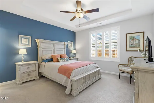 a kitchen with stainless steel appliances granite countertop a sink stove refrigerator and cabinets