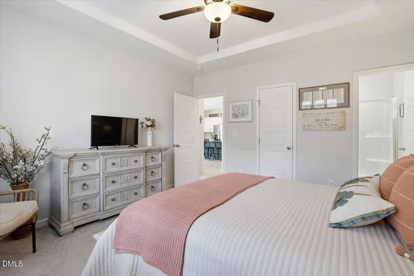 a bed room with a bed and a couch