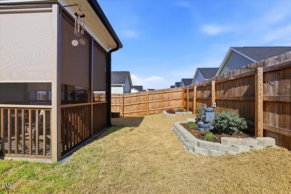 a view of a chairs and table in the balcony