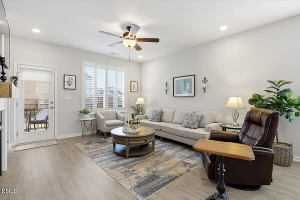 front view of the house with potted plants