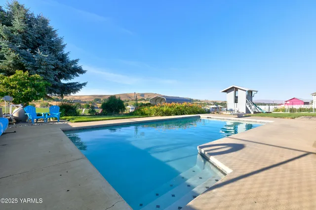 a view of swimming pool from a terrace