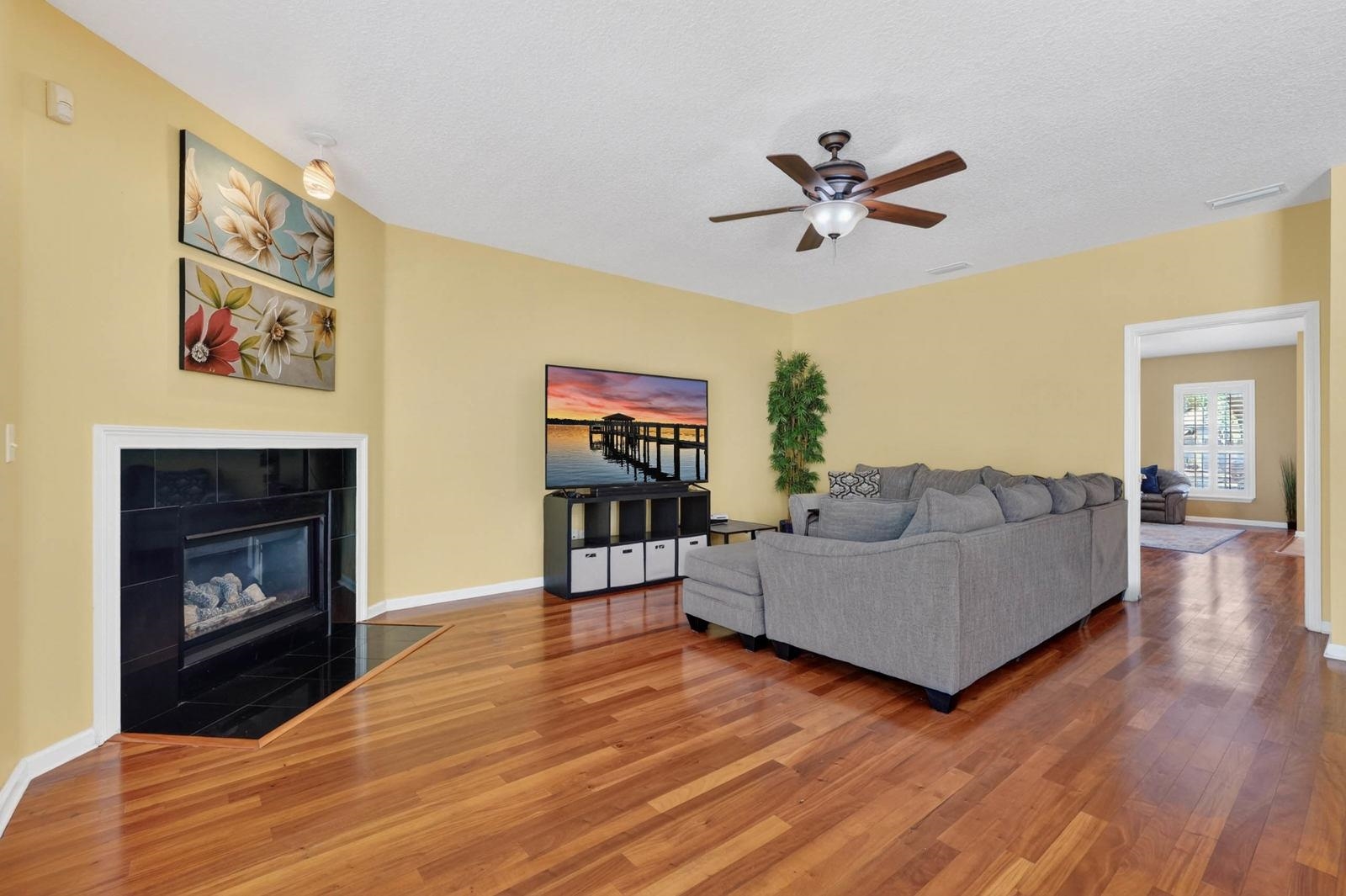 1237 Splendid Ravine Street St. Augustine, FL 32092 - Photo 8 of 62 a living room with furniture and a fireplace
