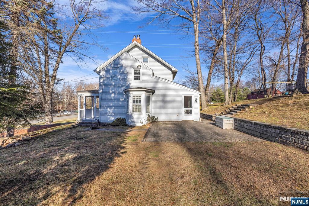 265 Little Falls Road Cedar Grove, NJ 07009 - Photo 38 of 44 a view of a house with a yard