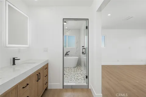 a view of a swimming pool with a lounge chairs