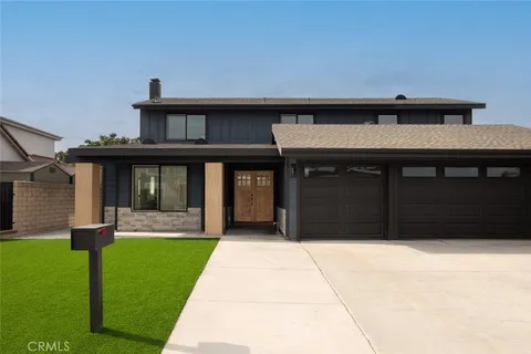 a front view of house with yard