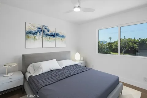 a view of a house with swimming pool and a yard