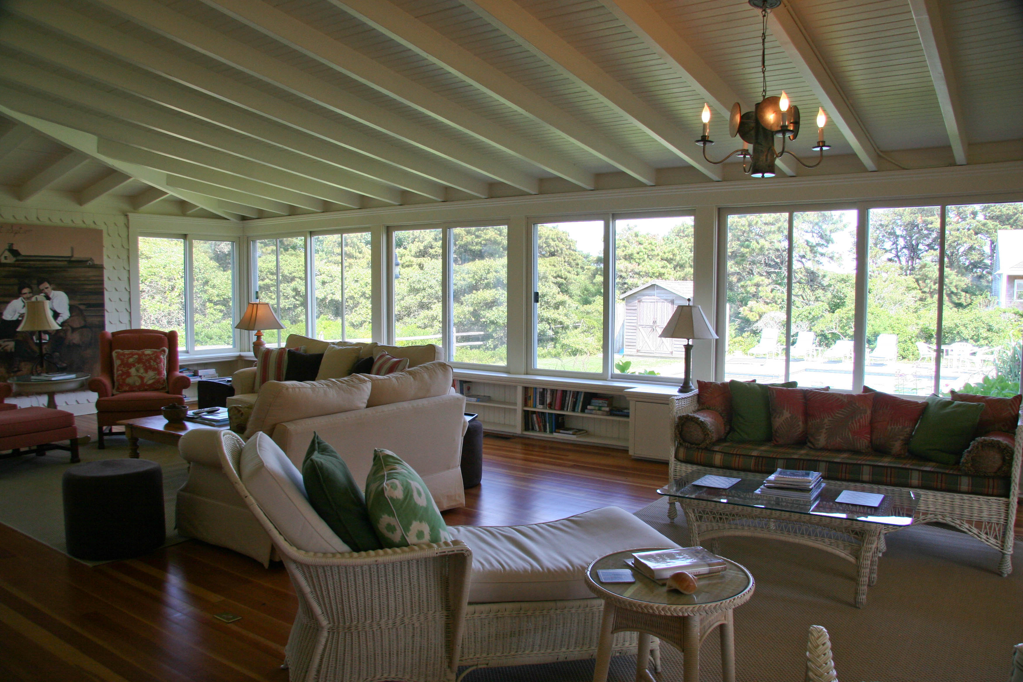 144 Surfside Road Nantucket, MA 02554 - Photo 12 of 46 a living room with furniture and a large window