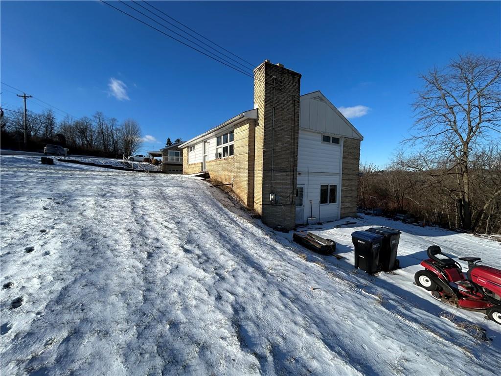 1512 Spring Run Road Extension Coraopolis, PA 15108 - Photo 28 of 29 a car parked on the side of the road
