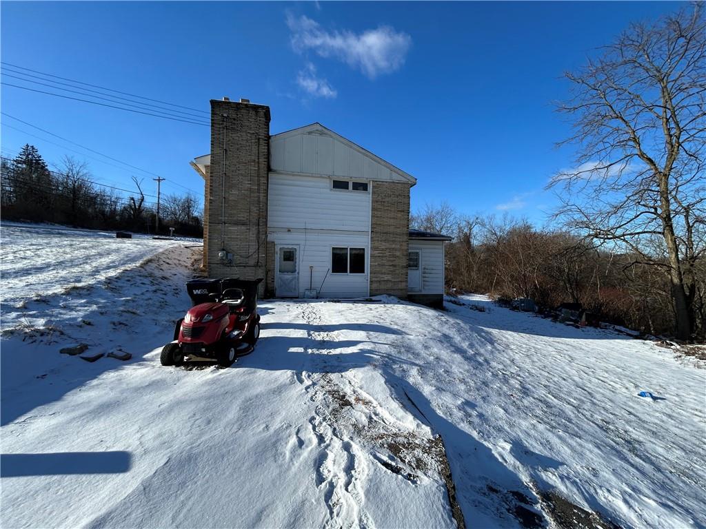1512 Spring Run Road Extension Coraopolis, PA 15108 - Photo 29 of 29 a view of a house with a patio
