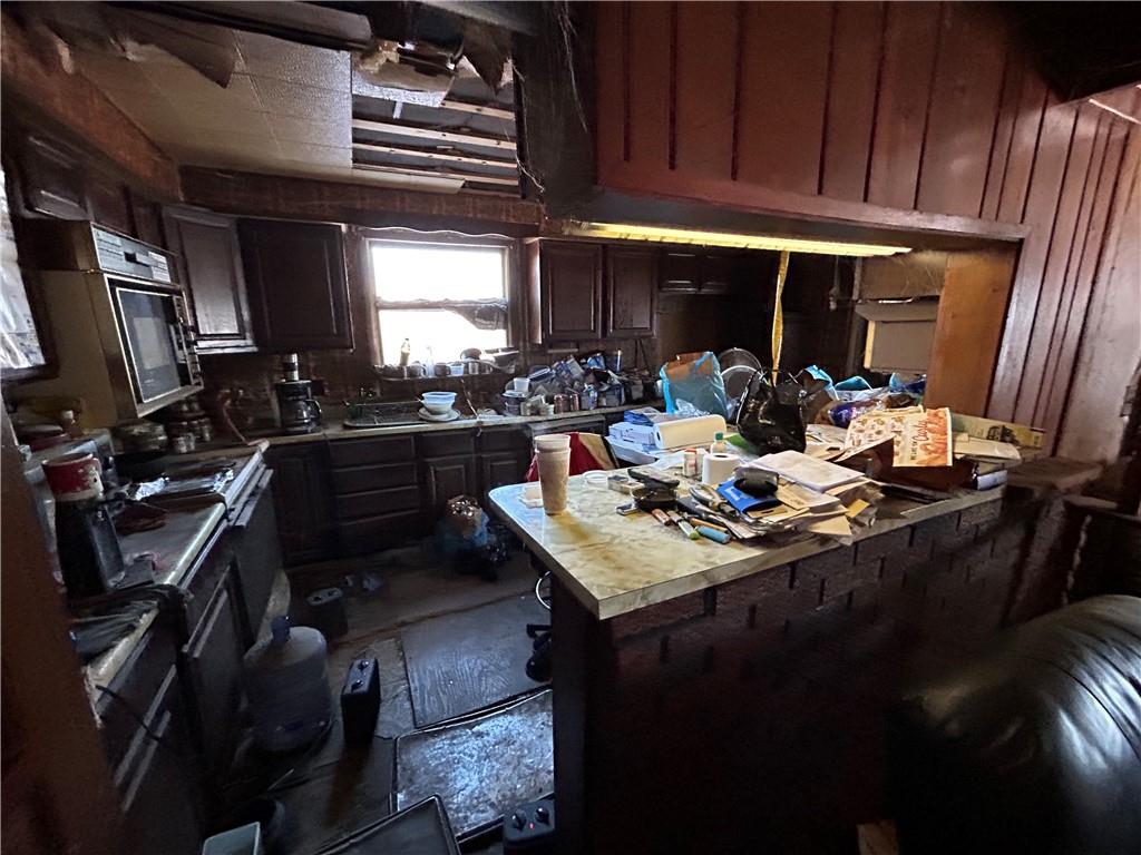 1512 Spring Run Road Extension Coraopolis, PA 15108 - Photo 5 of 29 a kitchen with a sink appliances and cabinets