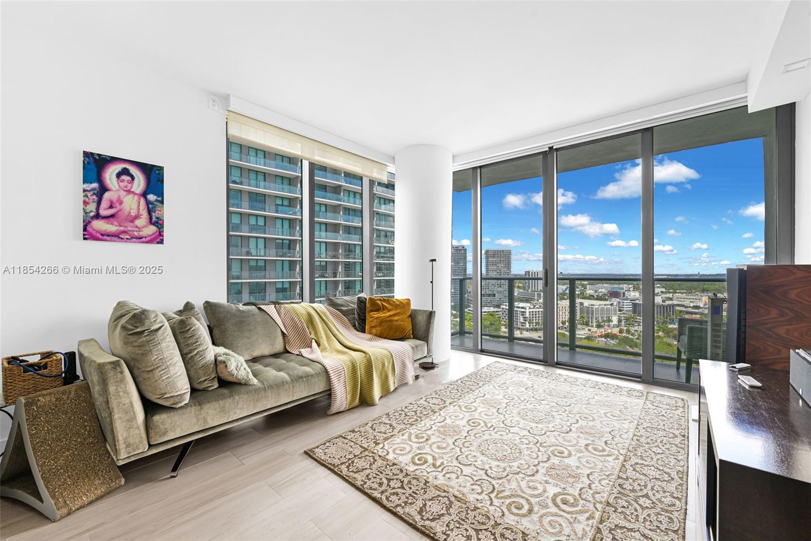650 Northeast 32nd Street, Unit 2201 Miami, FL 33137 - Photo 24 of 35 a living room with furniture and a large window