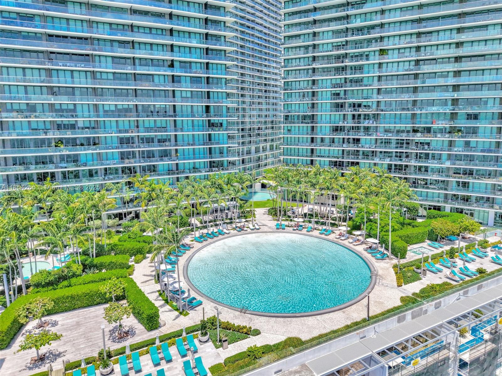 650 Northeast 32nd Street, Unit 2201 Miami, FL 33137 - Photo 34 of 35 a view of a swimming pool with a patio