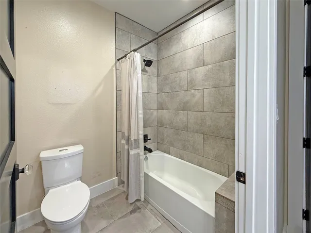 a view of a living room with a large mirror