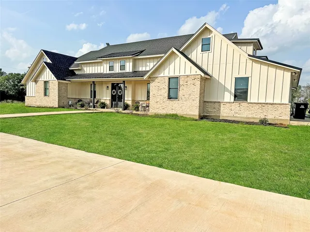 a view of a lake with a garden