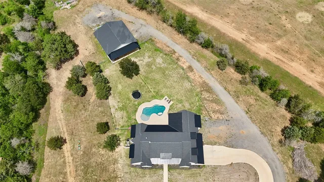 a front of a house with a garden