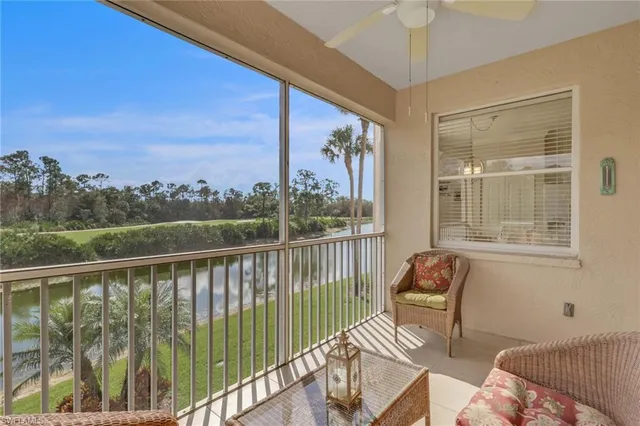 a view of a balcony with furniture
