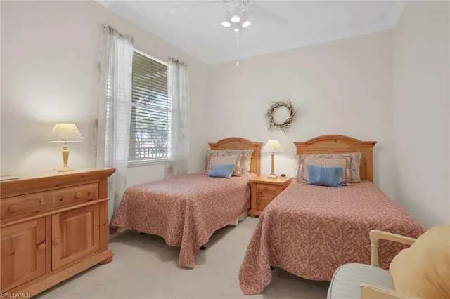 a bathroom with a granite countertop sink toilet a large mirror a shower and a bathtub