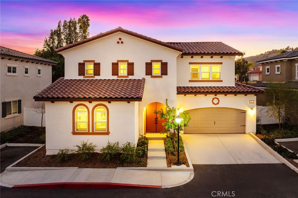 1359 Point Loma Place Walnut, CA 91789 - Photo 3 of 75 a front view of a house with a yard