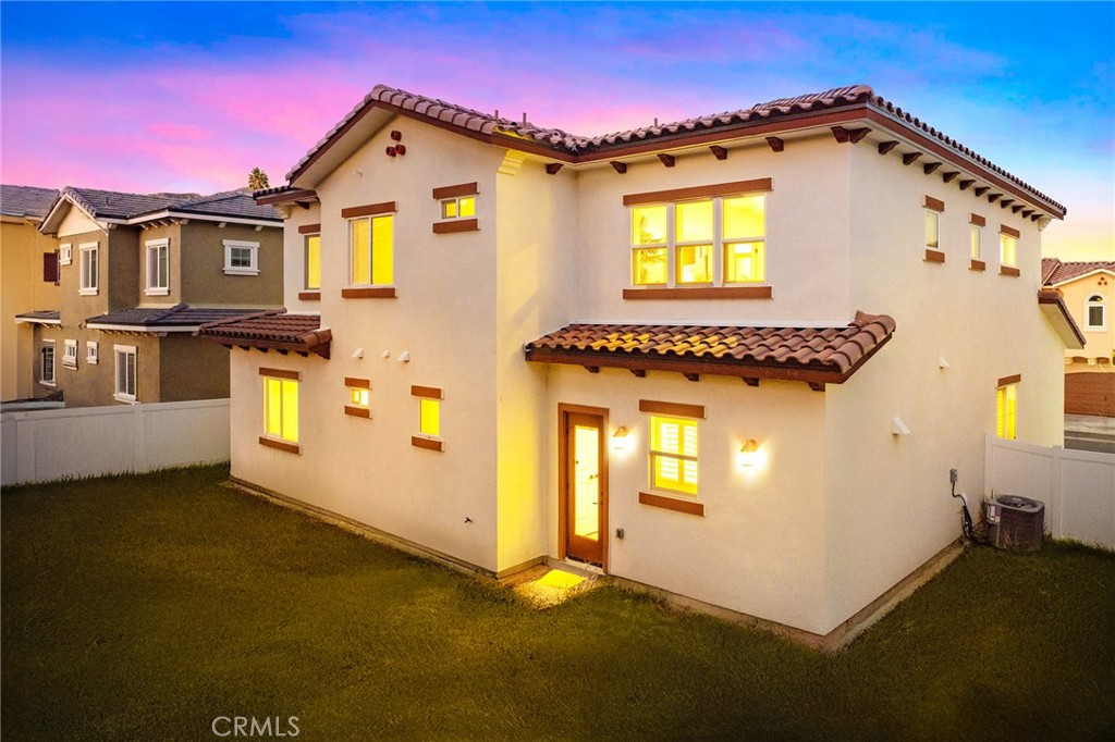 1359 Point Loma Place Walnut, CA 91789 - Photo 4 of 75 a front view of a house with a garage