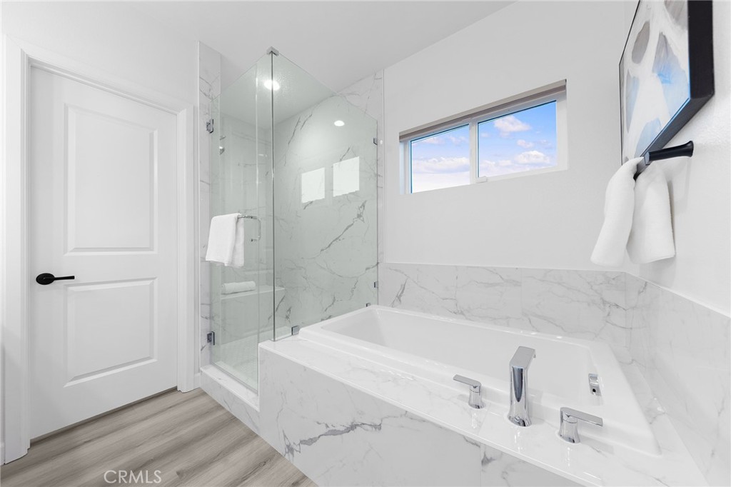 1359 Point Loma Place Walnut, CA 91789 - Photo 46 of 75 a bathroom with a bathtub and a shower
