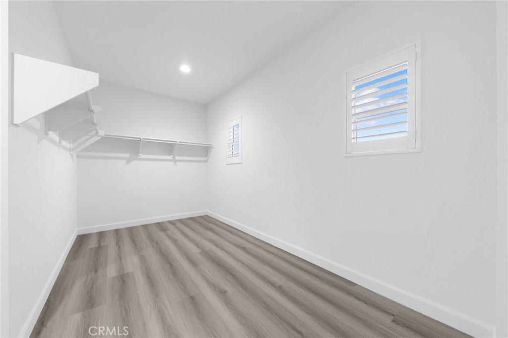 1359 Point Loma Place Walnut, CA 91789 - Photo 47 of 75 an empty room with wooden floor and windows