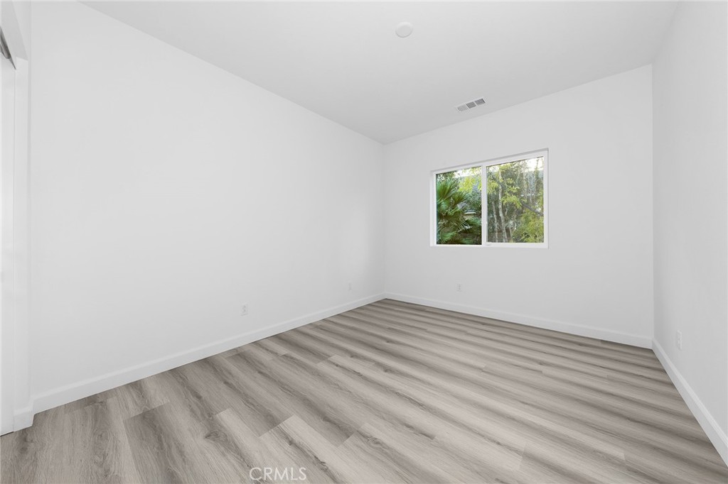 1359 Point Loma Place Walnut, CA 91789 - Photo 50 of 75 an empty room with windows
