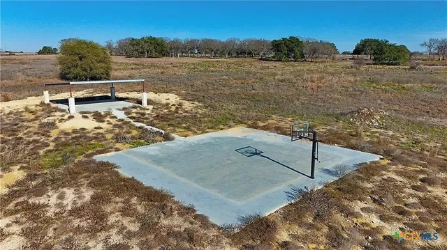 a view of a lake with a outdoor space