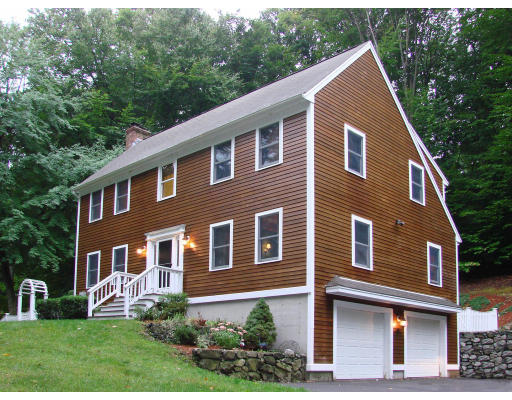 12 River Road Merrimac, MA 01860 - Photo 1 of 28 a front view of a house with a yard