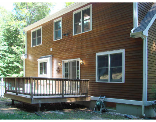 12 River Road Merrimac, MA 01860 - Photo 13 of 28 a front view of a house with a porch