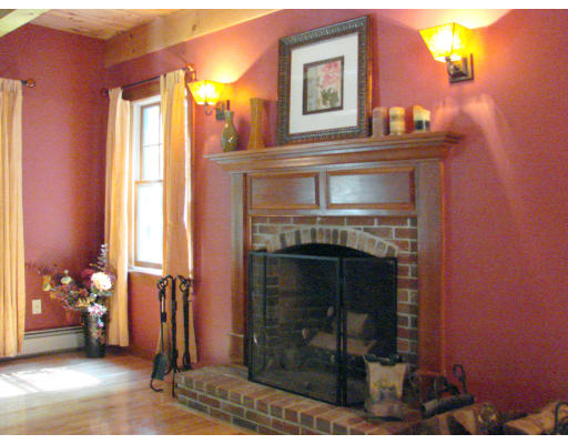 12 River Road Merrimac, MA 01860 - Photo 18 of 28 a living room with furniture and a fireplace