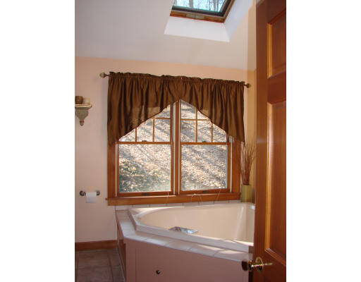 12 River Road Merrimac, MA 01860 - Photo 23 of 28 a bathroom with a bathtub and a shower