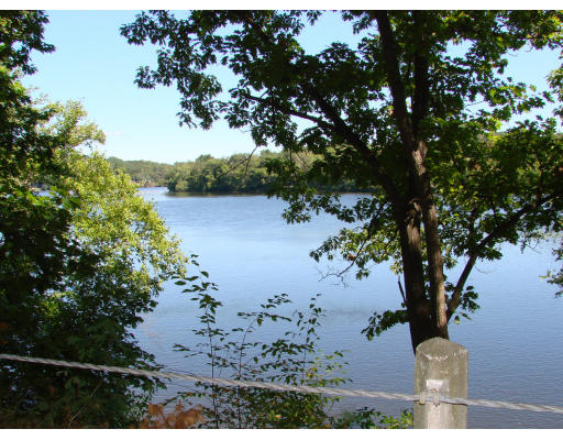 12 River Road Merrimac, MA 01860 - Photo 3 of 28 a view of a lake with outdoor space