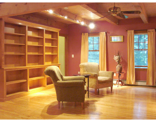 12 River Road Merrimac, MA 01860 - Photo 4 of 28 a living room with furniture a dining table and a large window