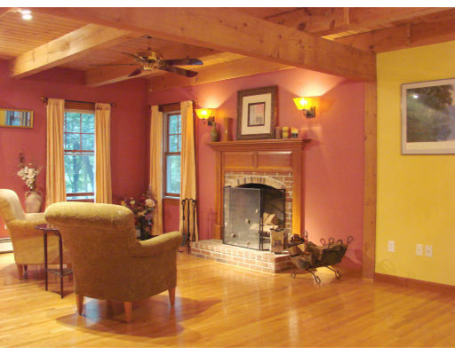 12 River Road Merrimac, MA 01860 - Photo 5 of 28 a living room with furniture and a fireplace