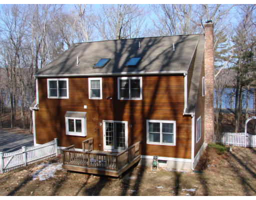 12 River Road Merrimac, MA 01860 - Photo 9 of 28 a front view of a house with windows
