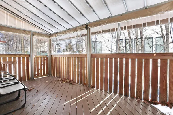 a view of a backyard with sitting area