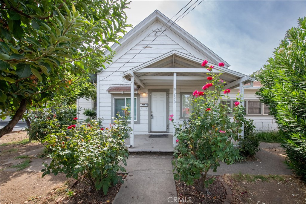 a front view of house with an outdoor space