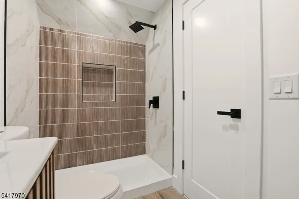 a bathroom with a sink and a shower